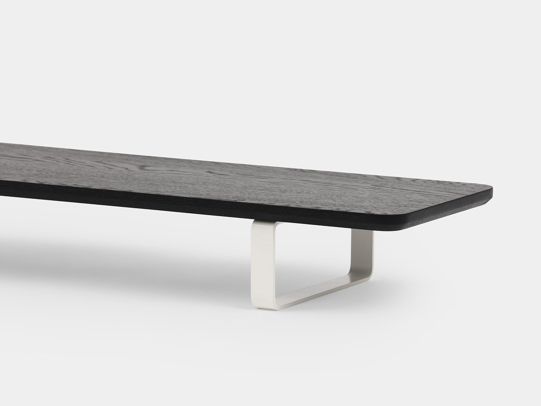 black wooden desk shelf with white legs - closeup | black, white