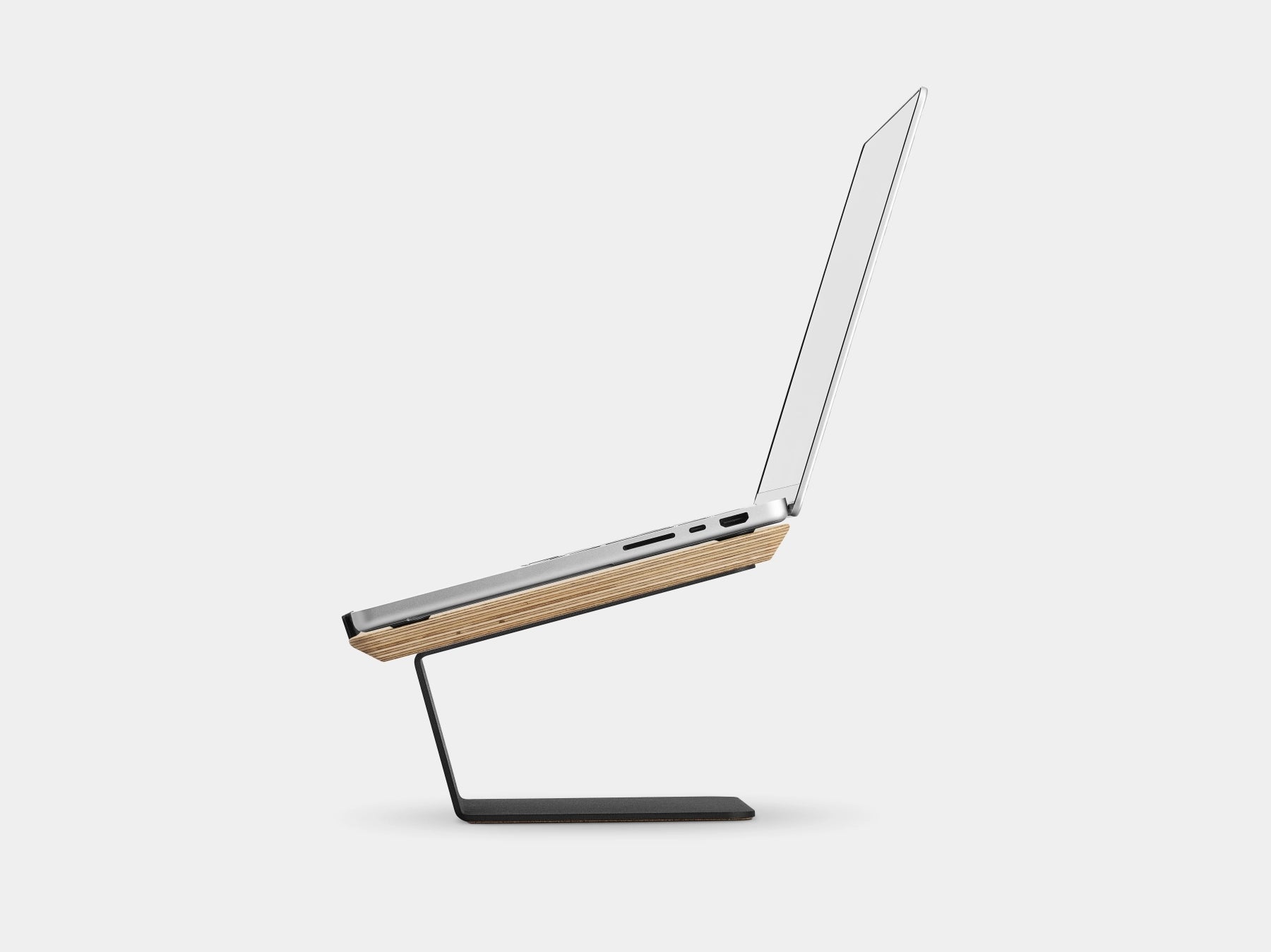 Wooden laptop stand on a white background | oak veneer, black