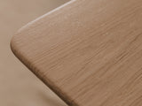 Close-up of a wooden surface with a blurred background  | light oak,