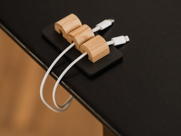 Magnetic cable organizer in oak and black – stylish wooden accessory for neat cord storage | oak, black