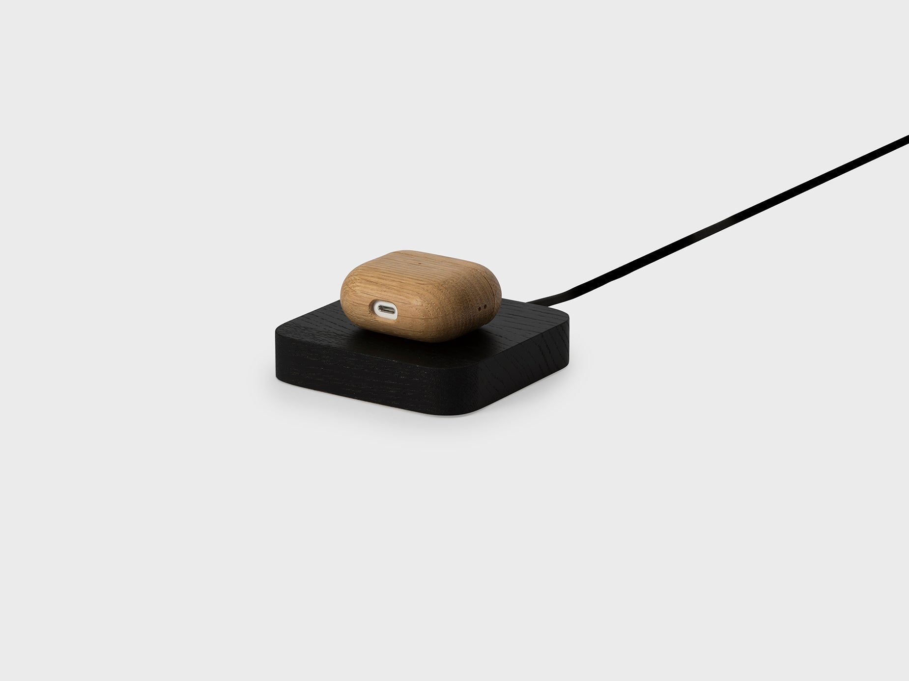 oakyblocks black wooden wireless charger side view airpods | black